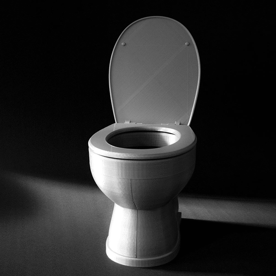 Gif of a model toilet. It's 3D printed and grey. In the gif, the toilet lid opens and closes