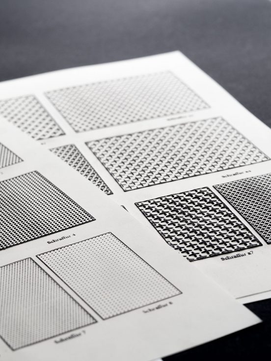 Pages of swell paper with different surface patterns